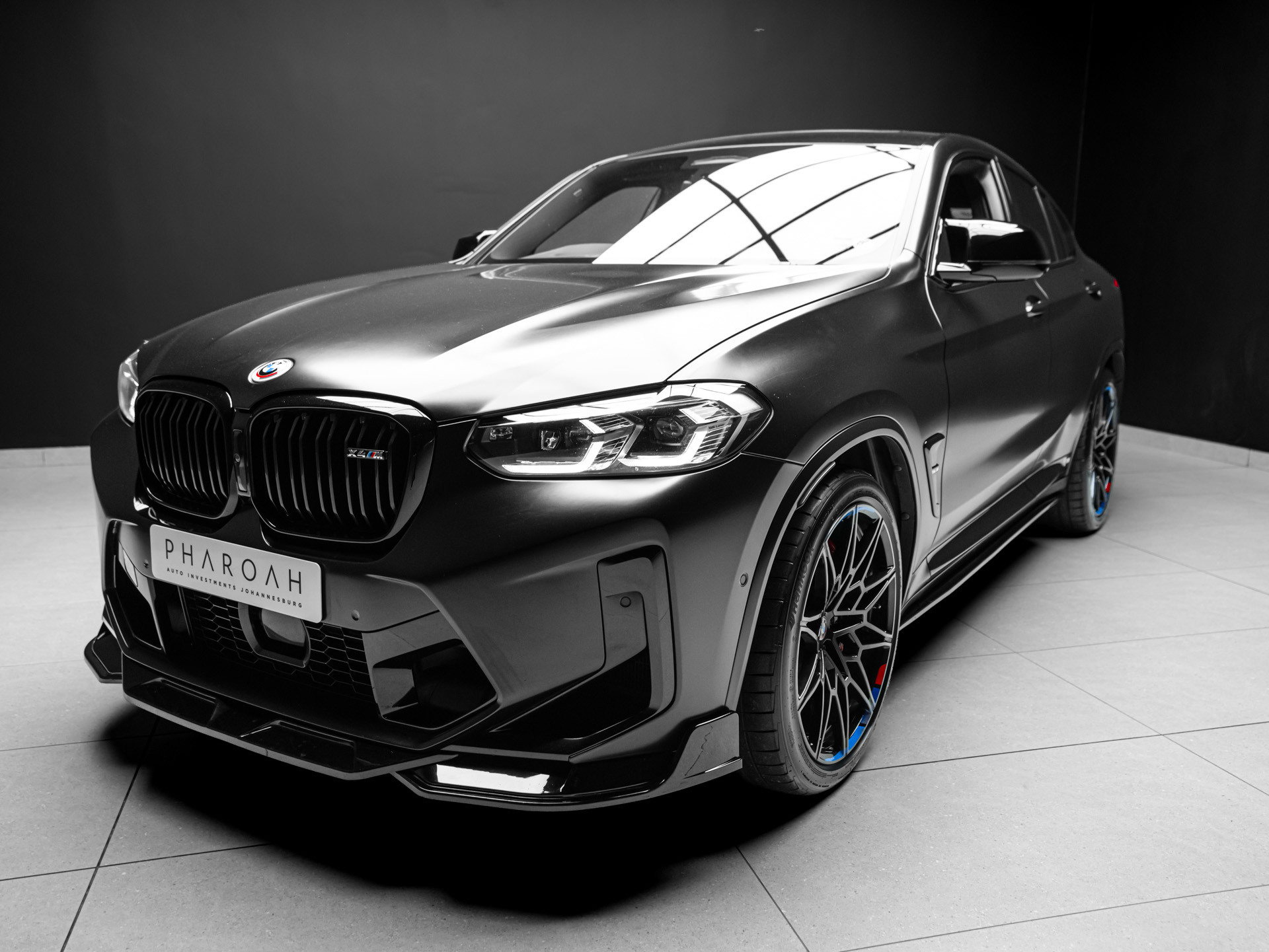 black bmw x4m 7