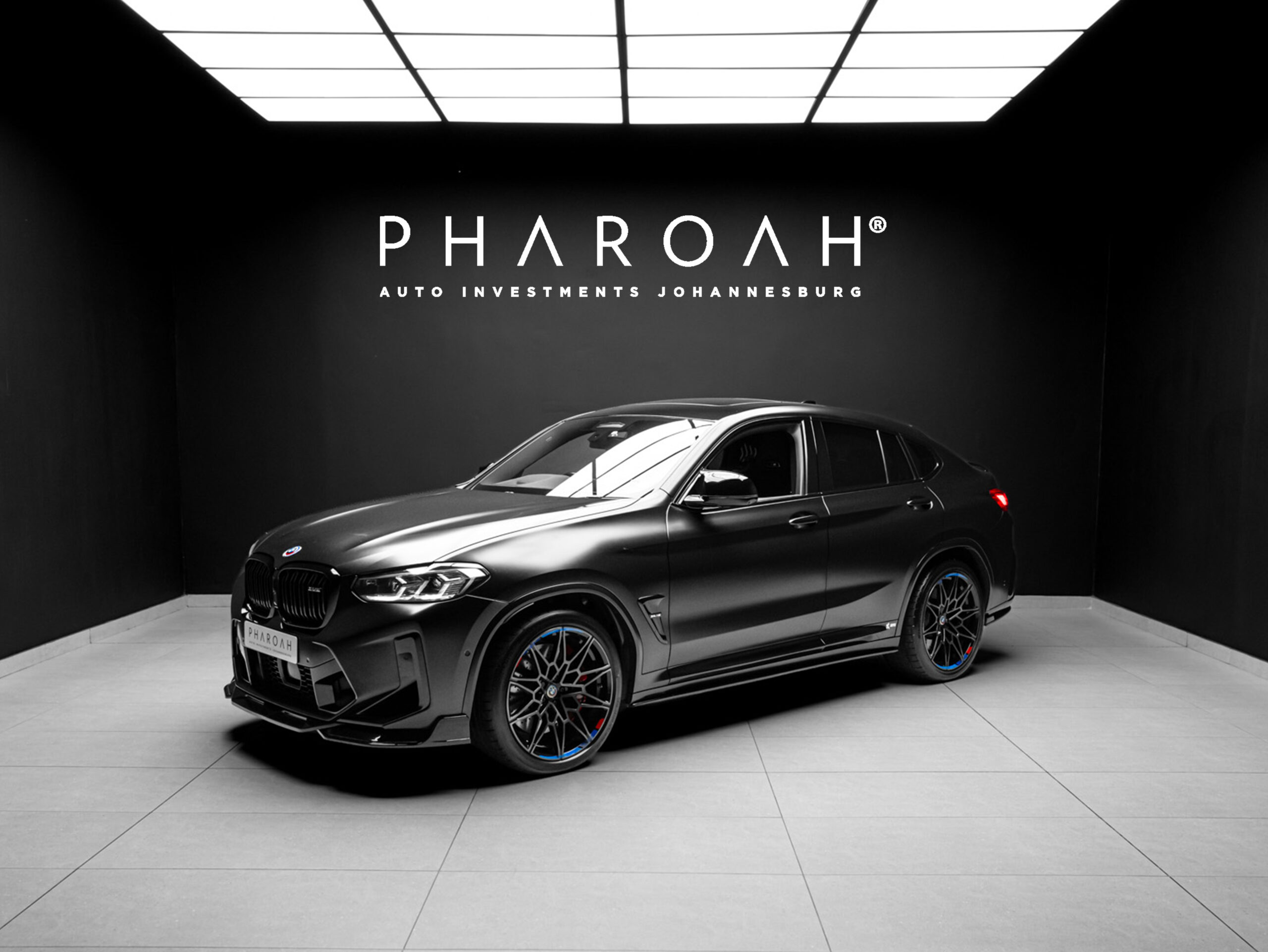 black bmw x4m cover