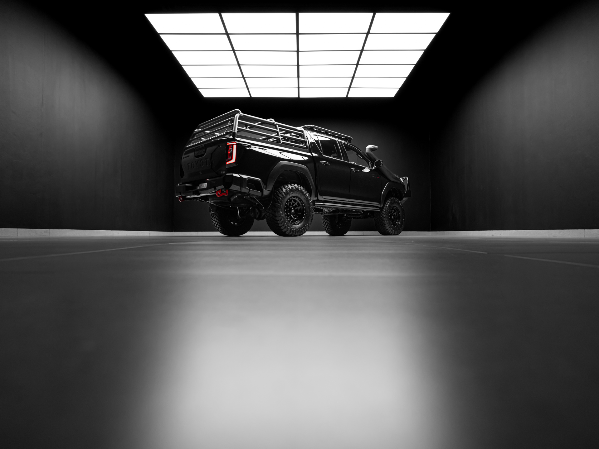 black toyota hilux 16