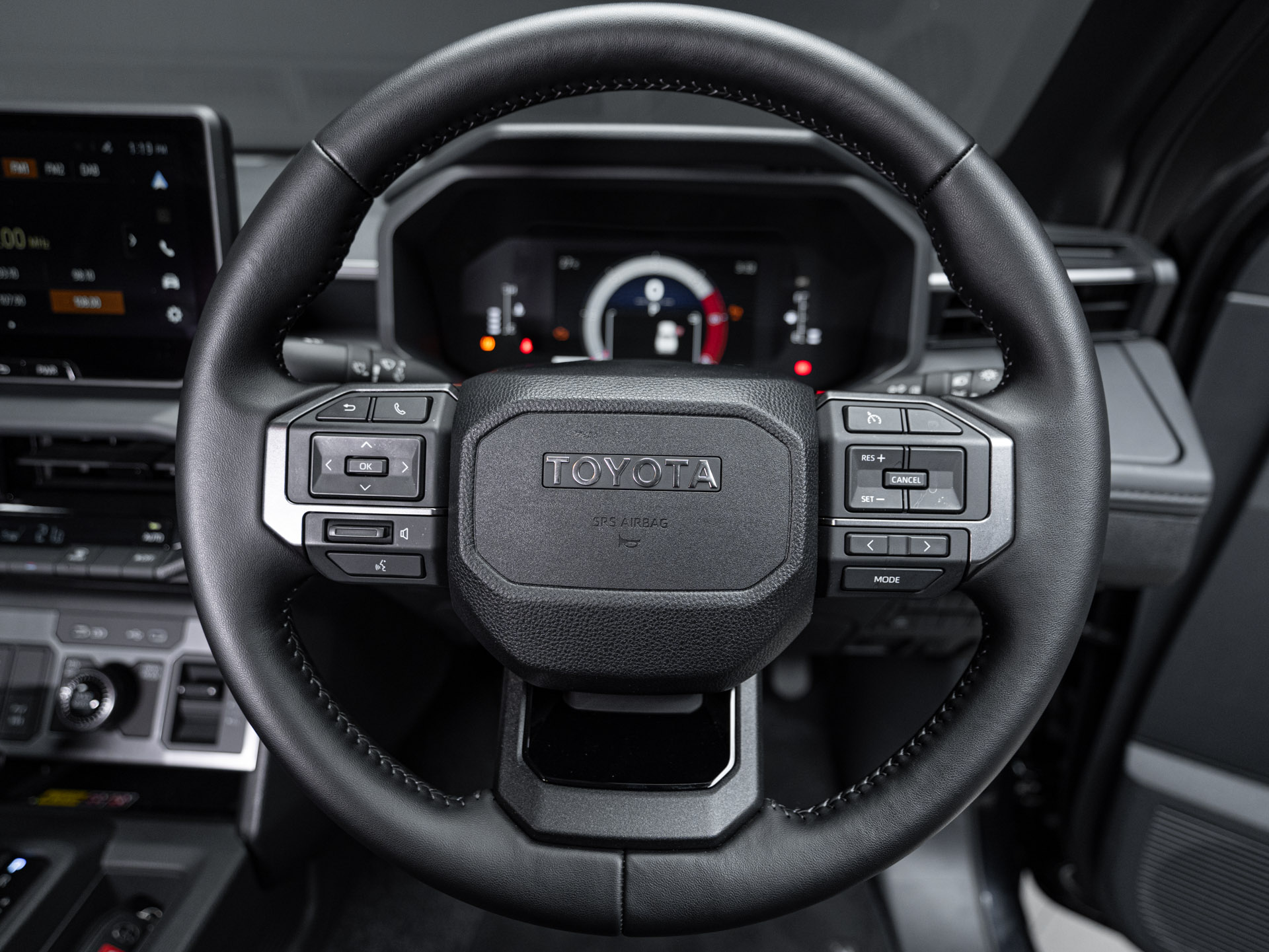 black toyota hilux 26