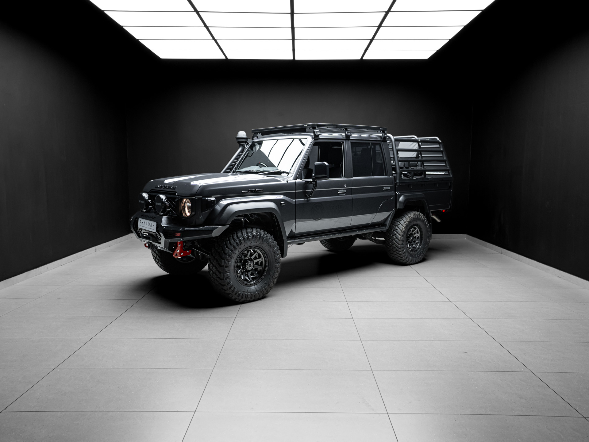 grey land cruiser cattle rail