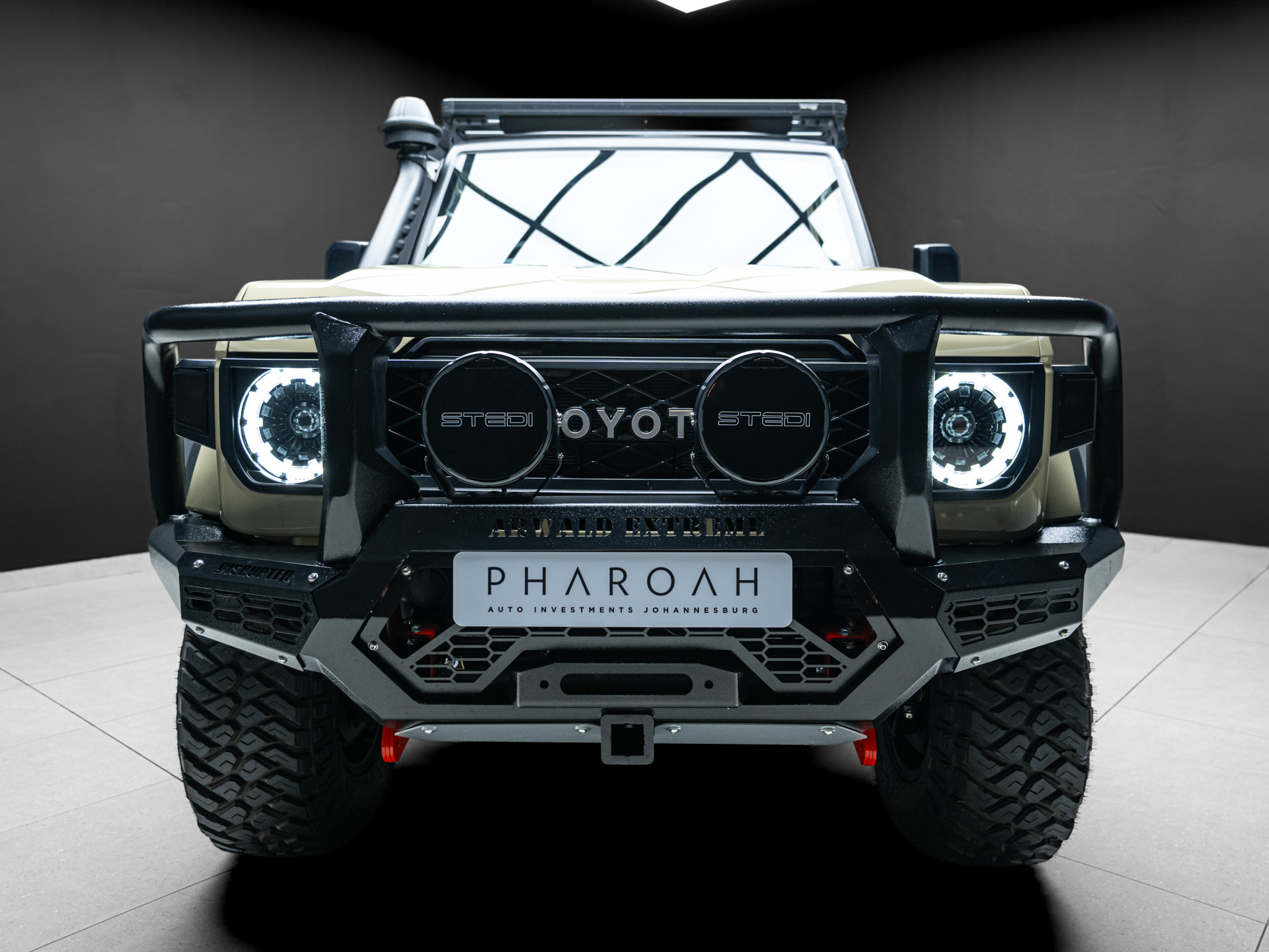 tan land cruiser 79 9