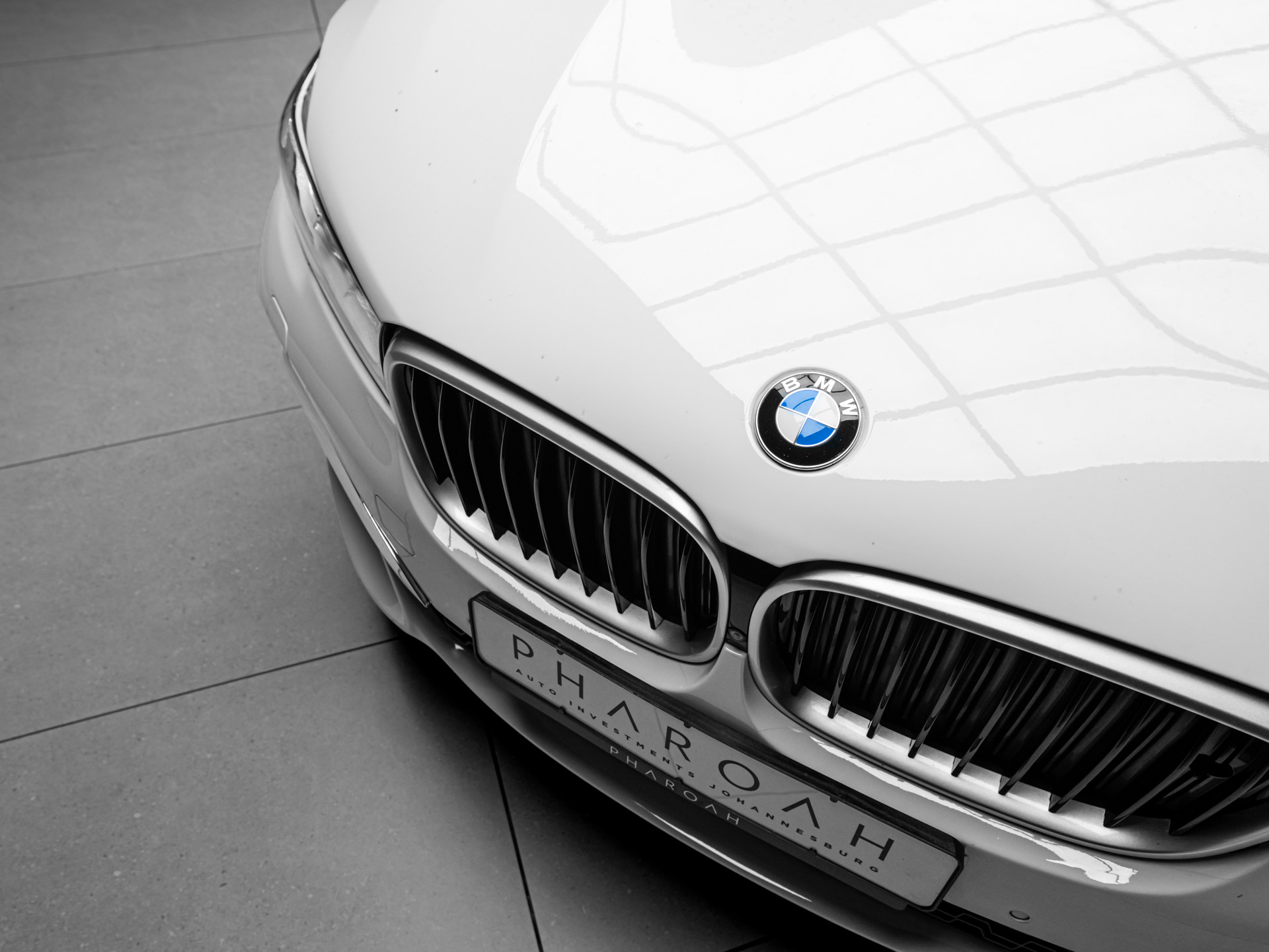 white bmw 750i 10