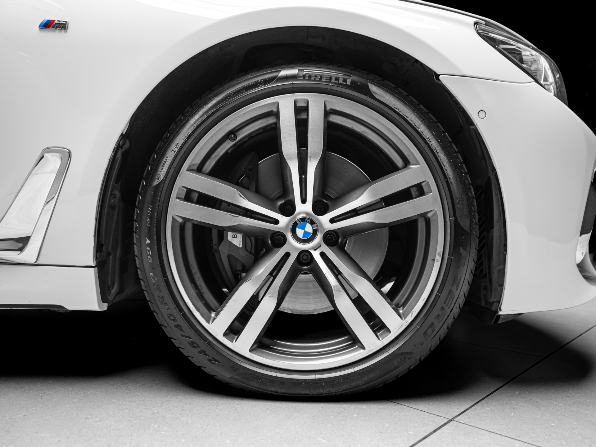 white bmw 750i 11