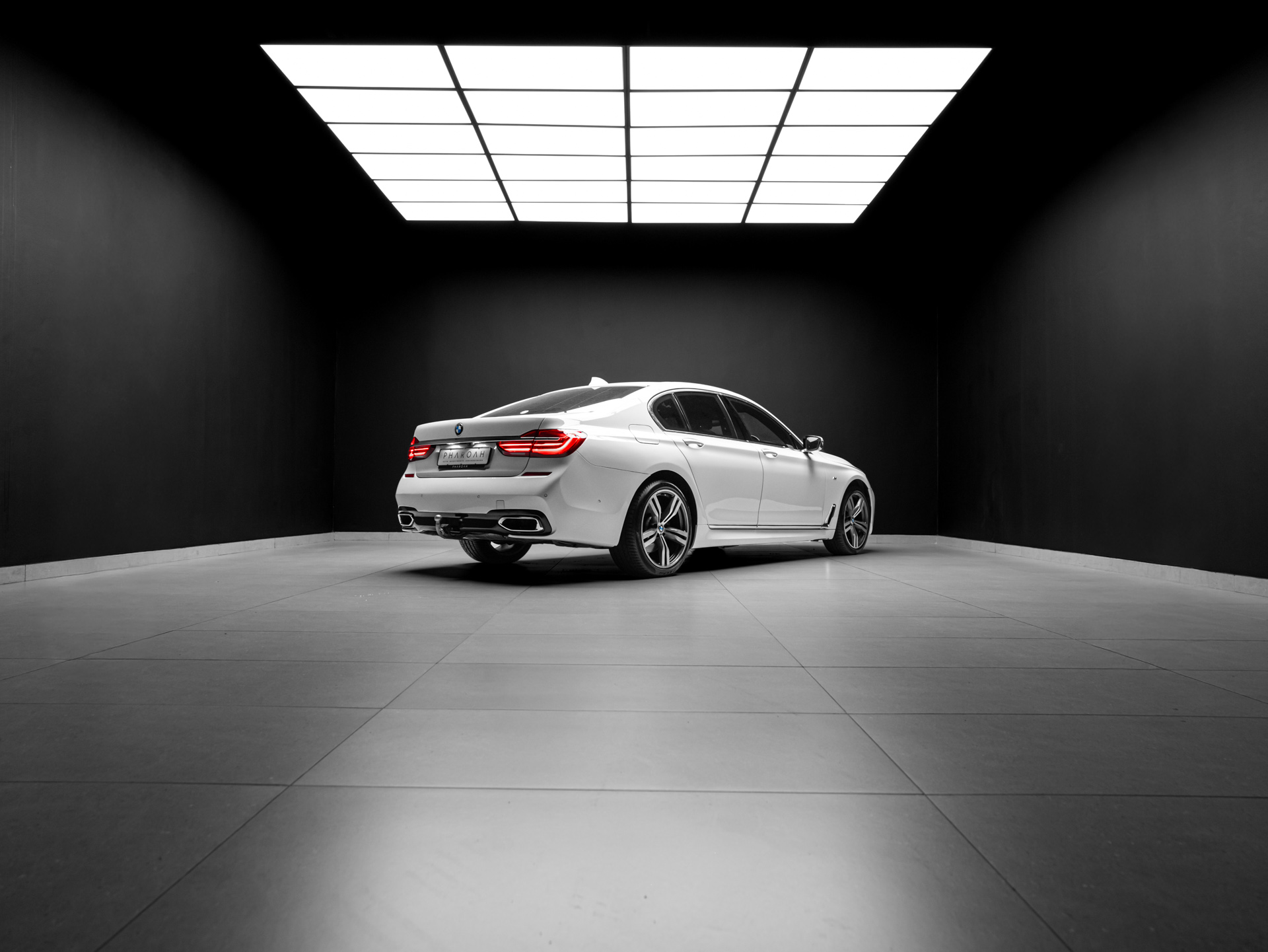 white bmw 750i 13
