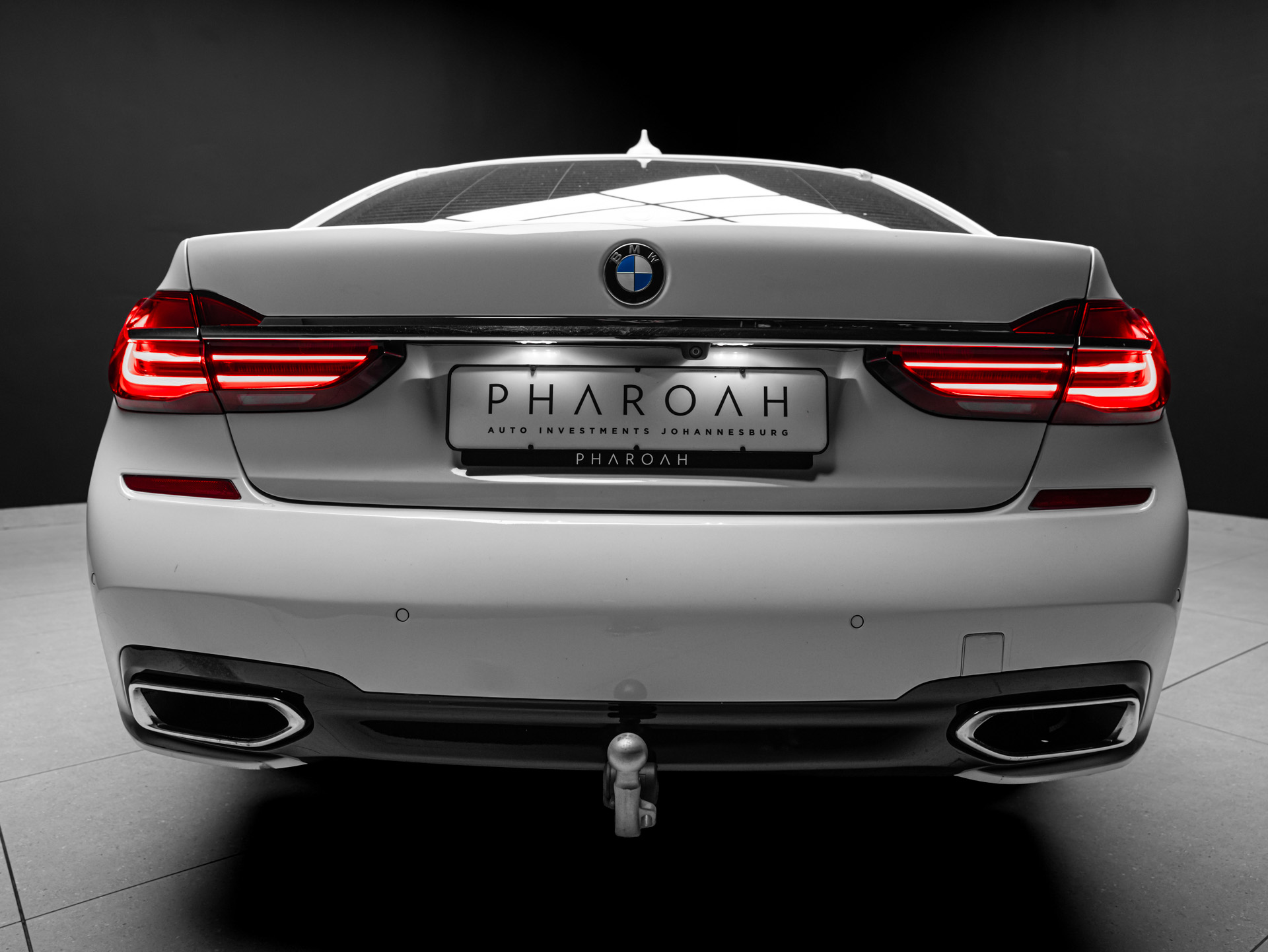 white bmw 750i 15