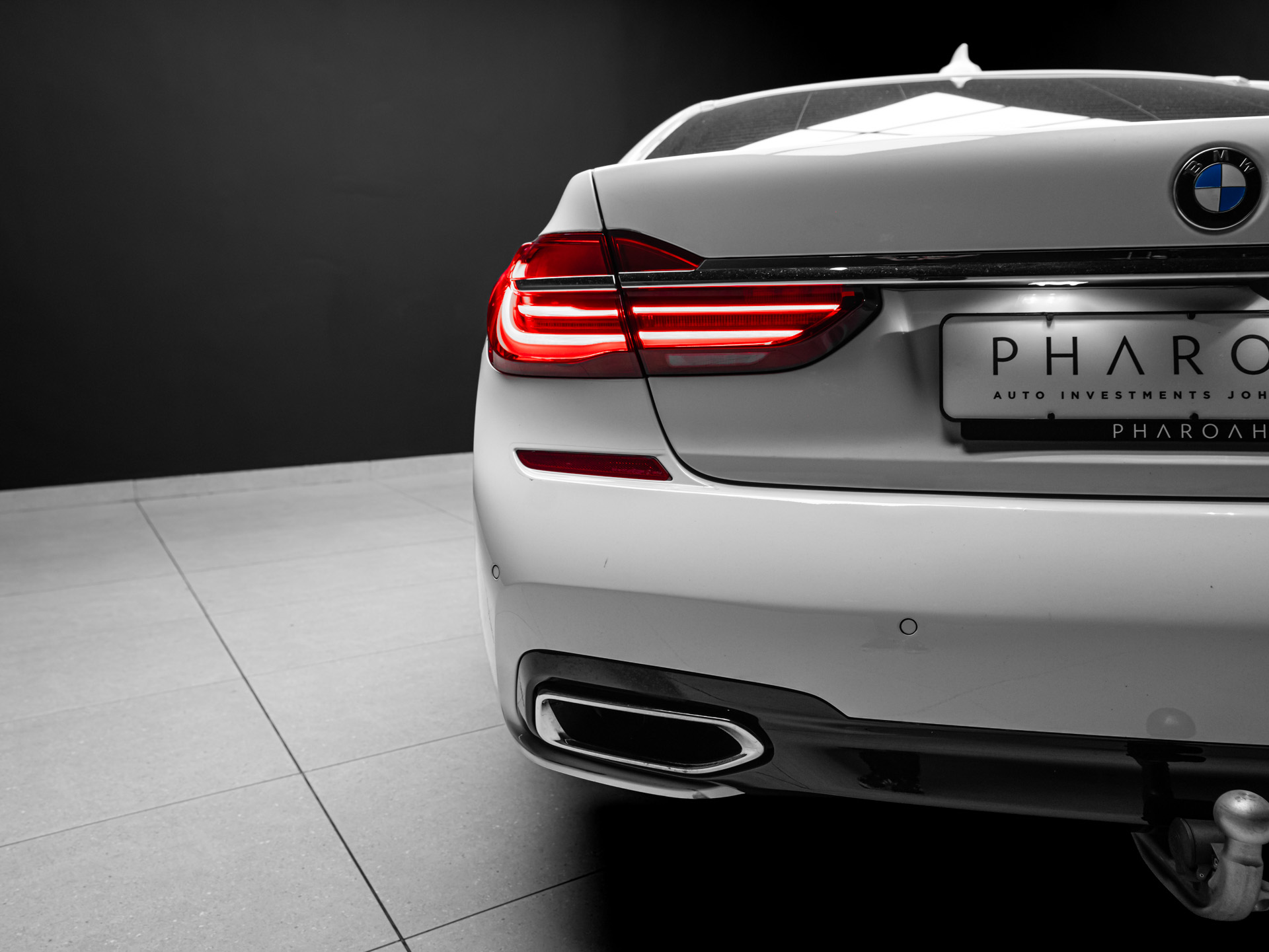 white bmw 750i 16