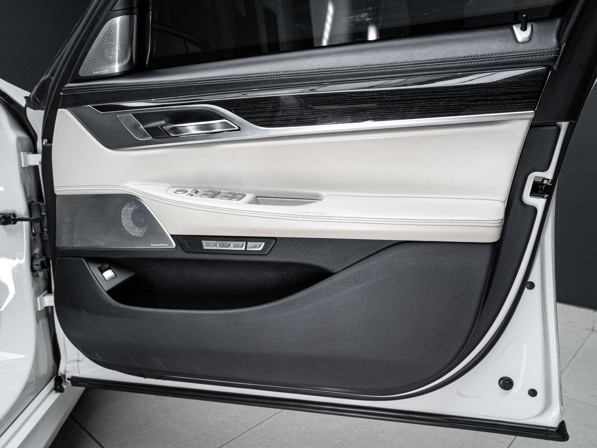 white bmw 750i 17
