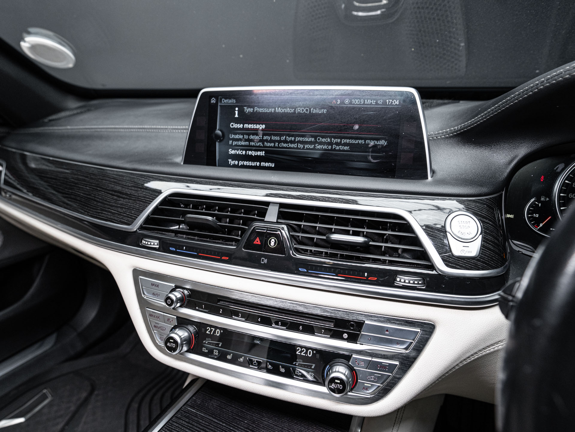 white bmw 750i 22