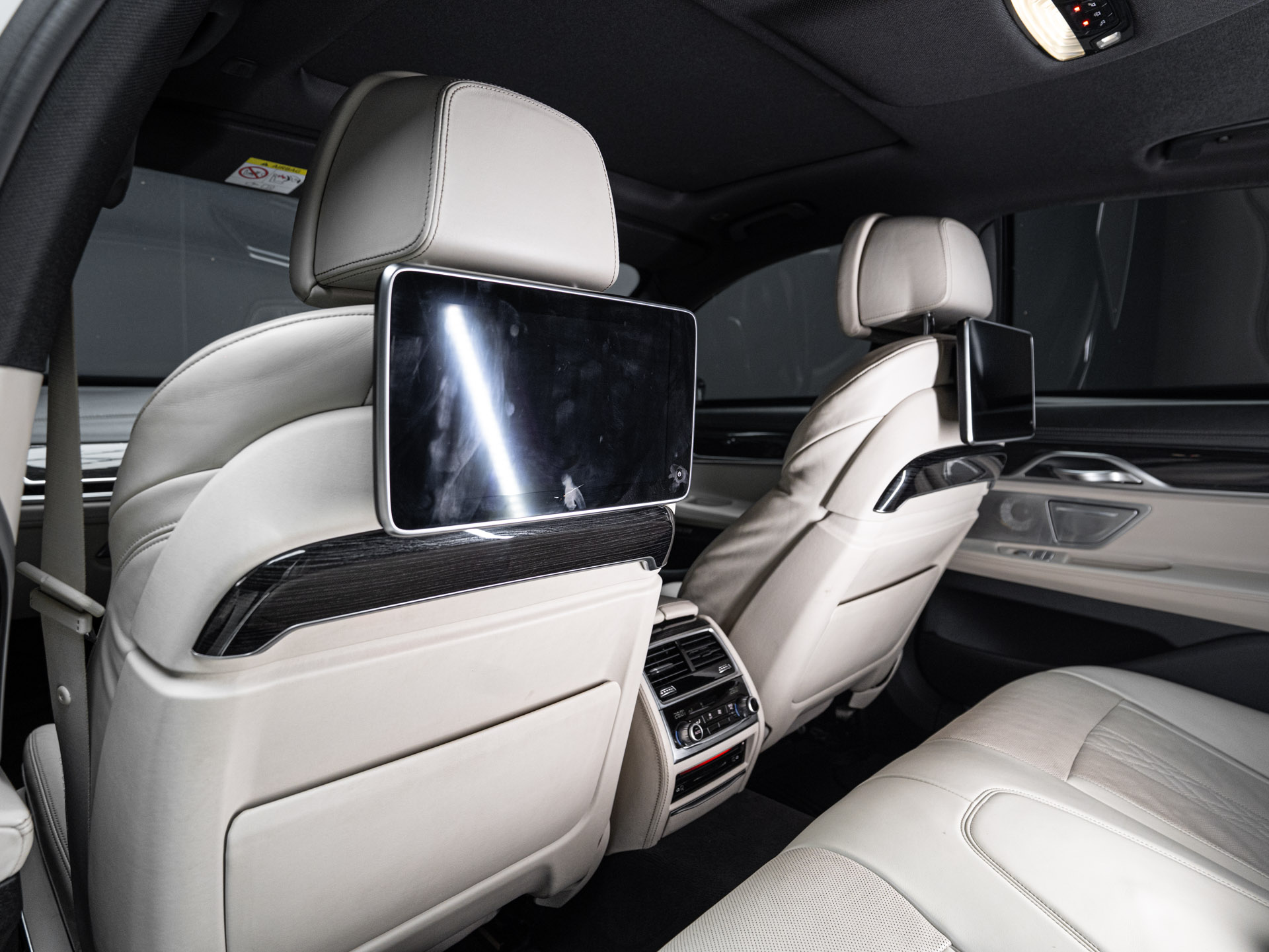 white bmw 750i 27
