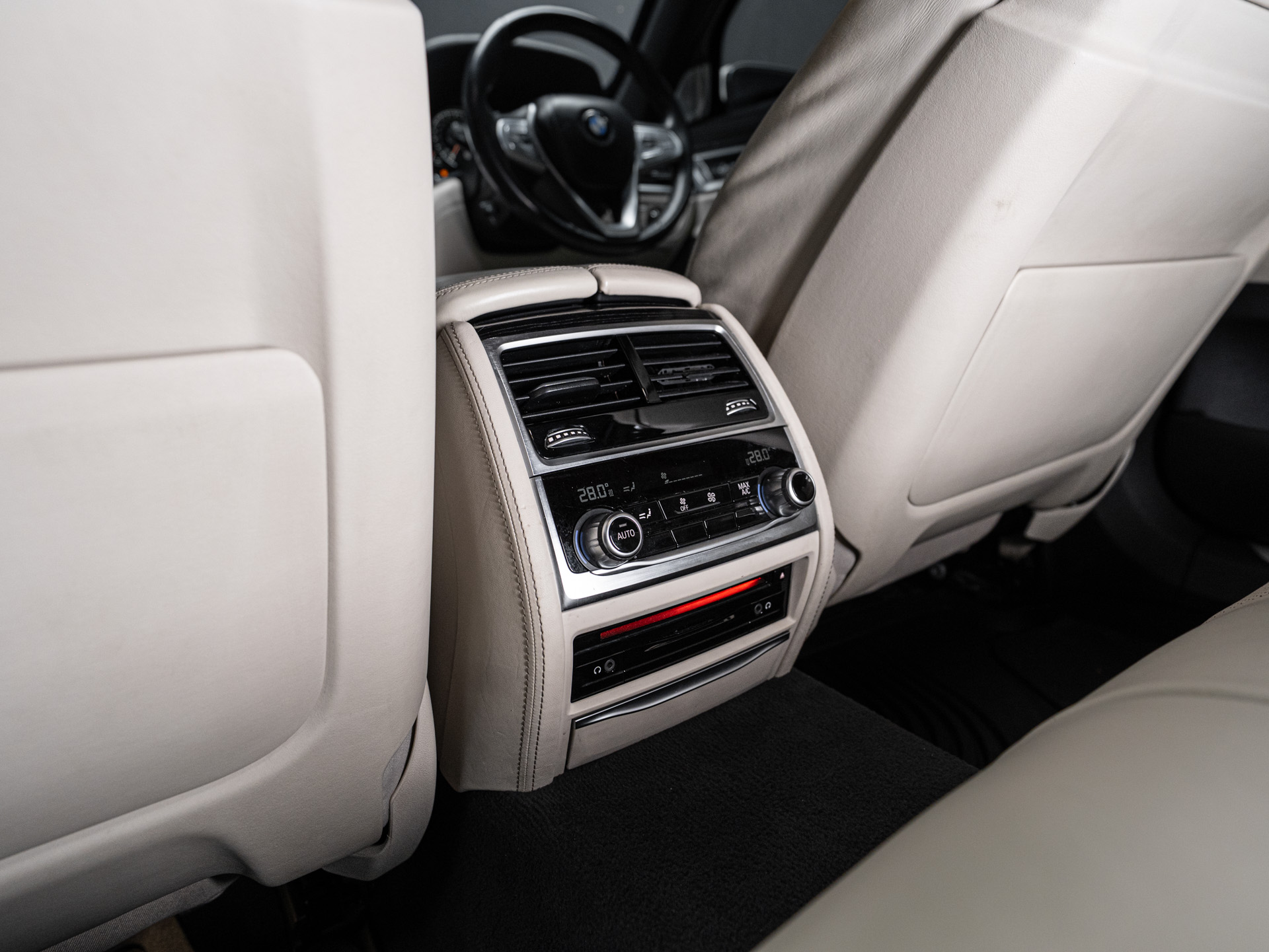white bmw 750i 28