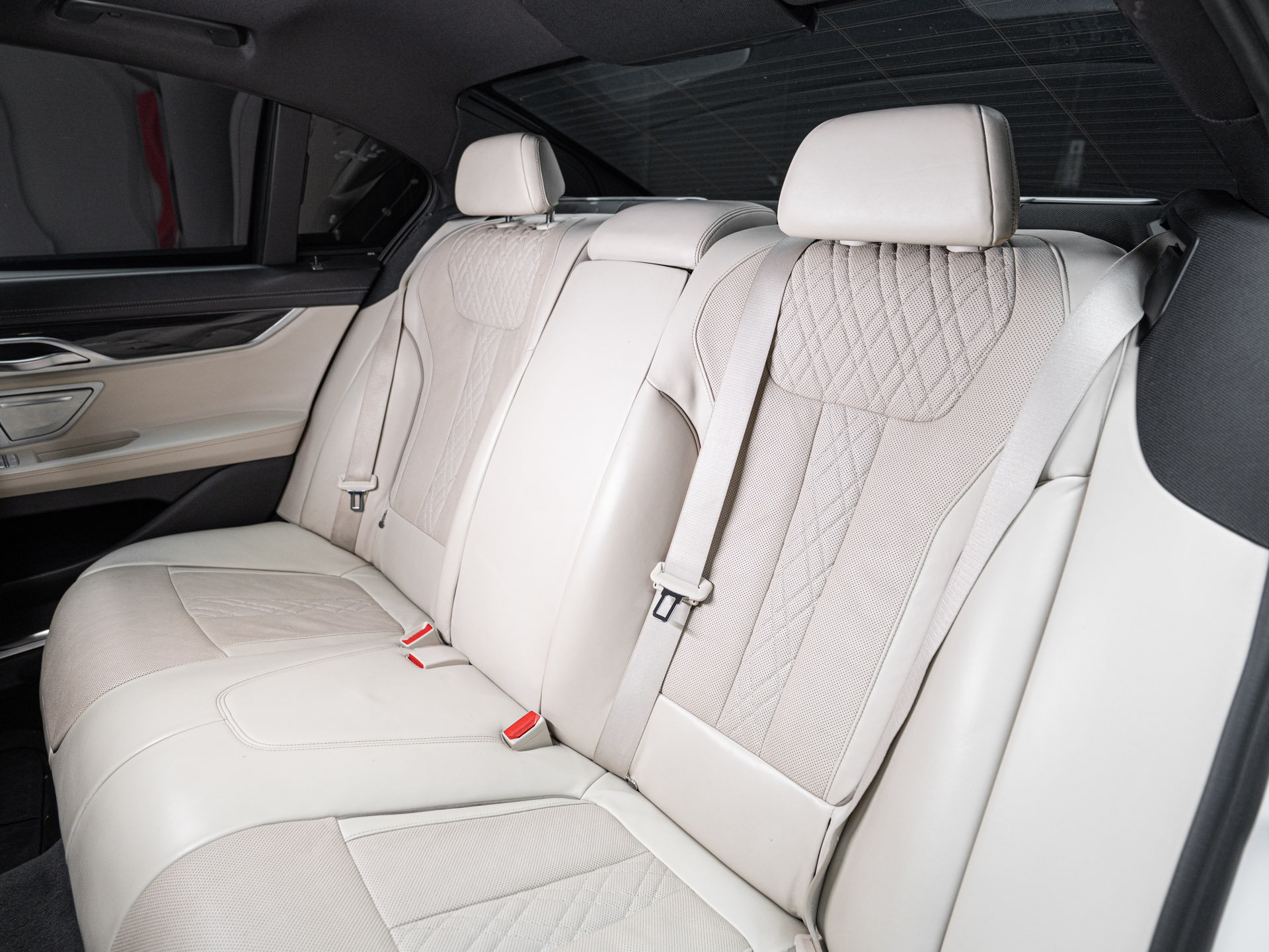 white bmw 750i 29