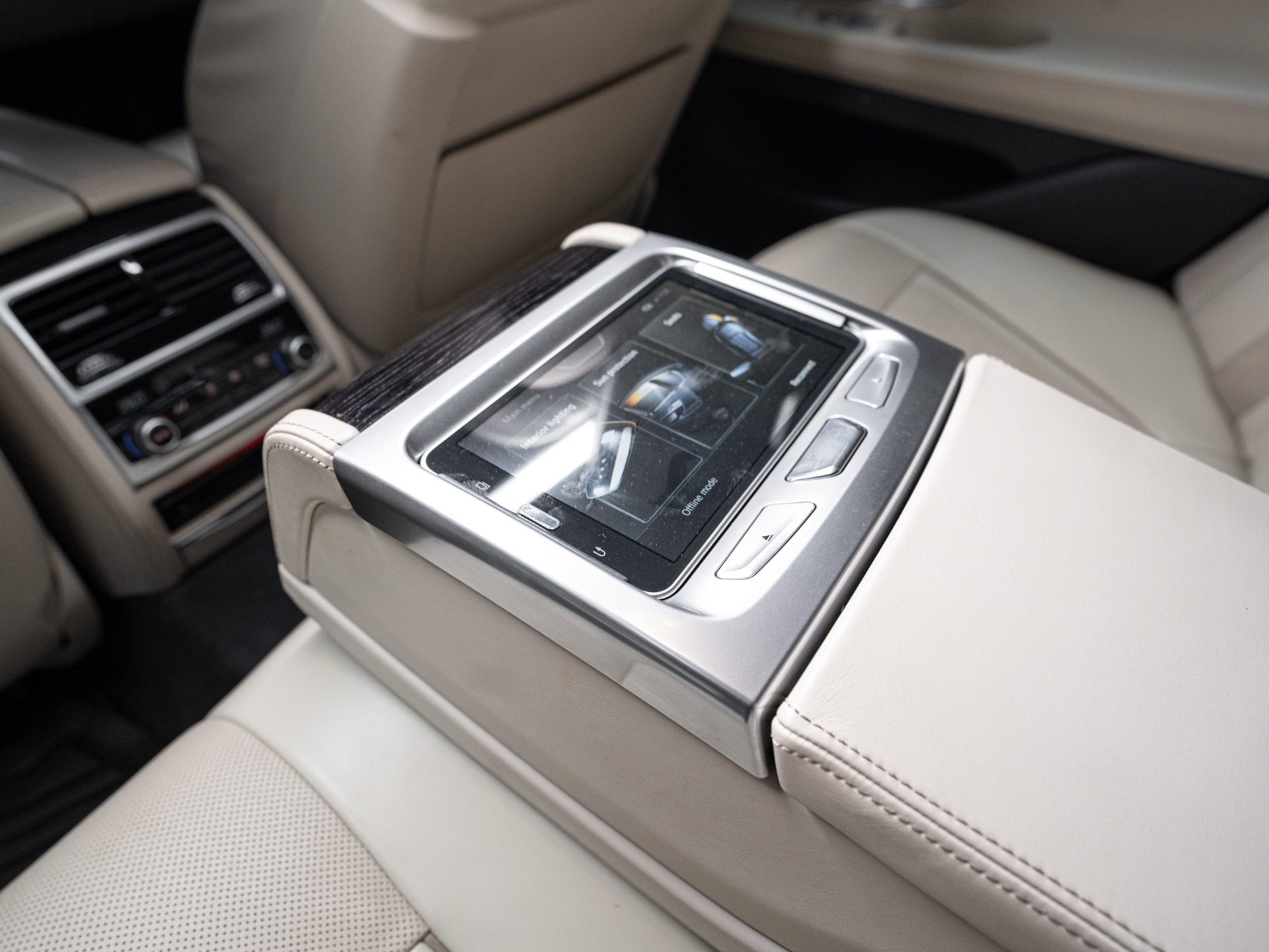 white bmw 750i 30