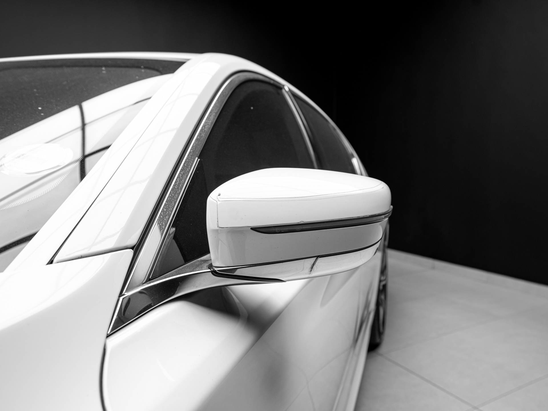 white bmw 750i 7