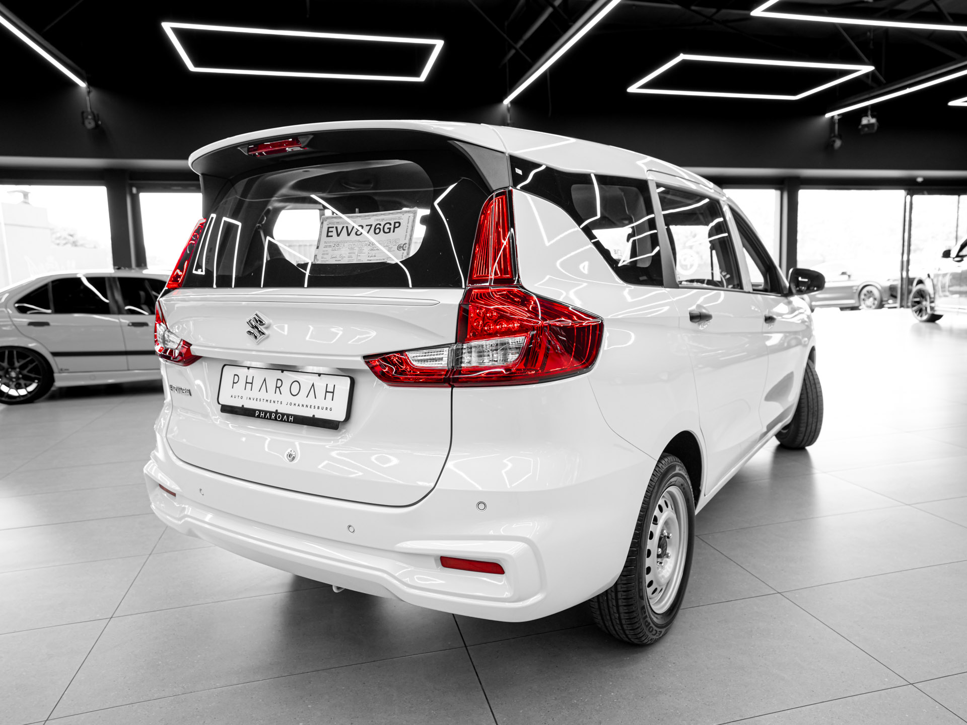 white suzuki ertiga 10