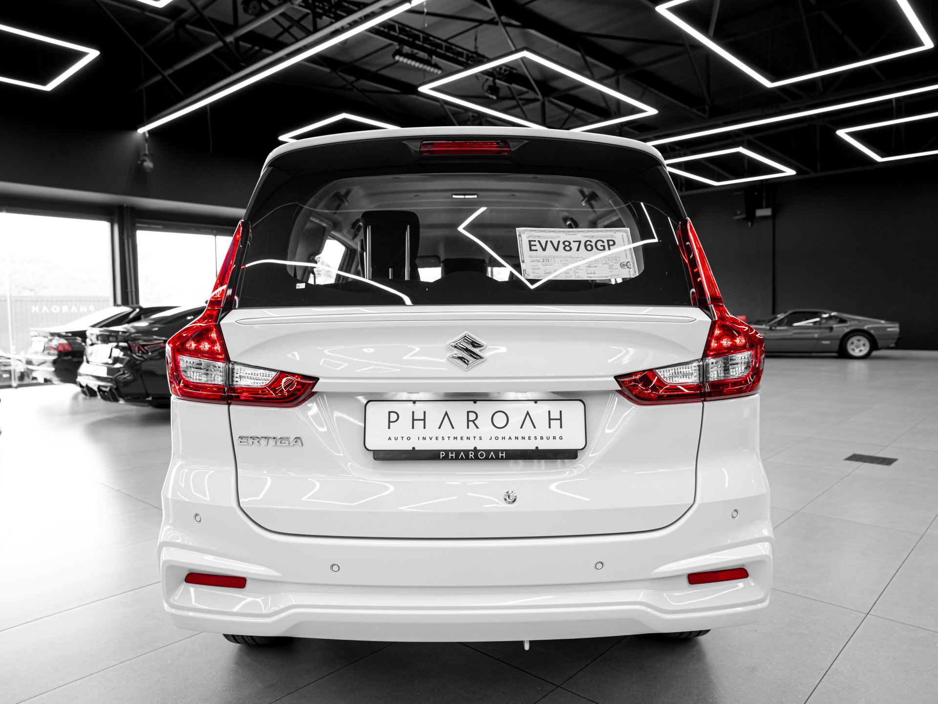 white suzuki ertiga 11