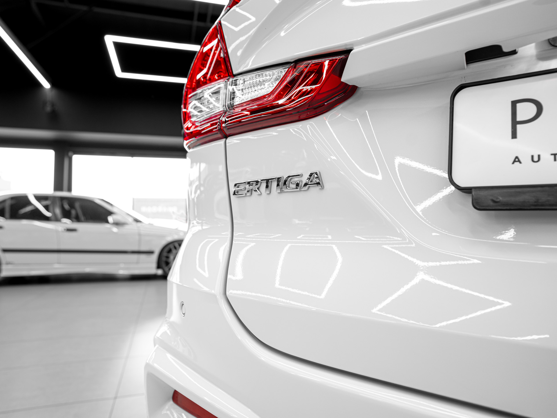 white suzuki ertiga 13