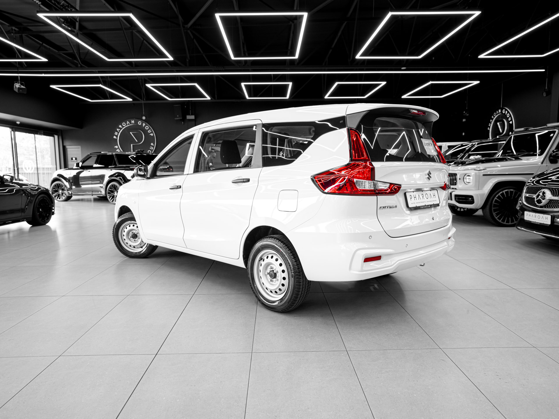 white suzuki ertiga 14