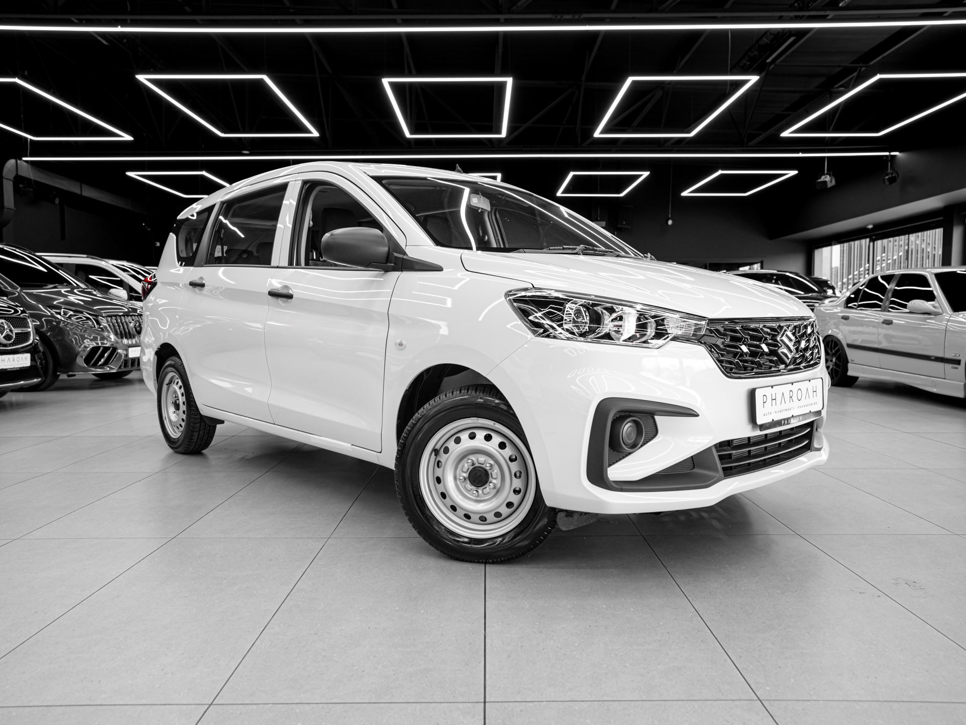 white suzuki ertiga 2
