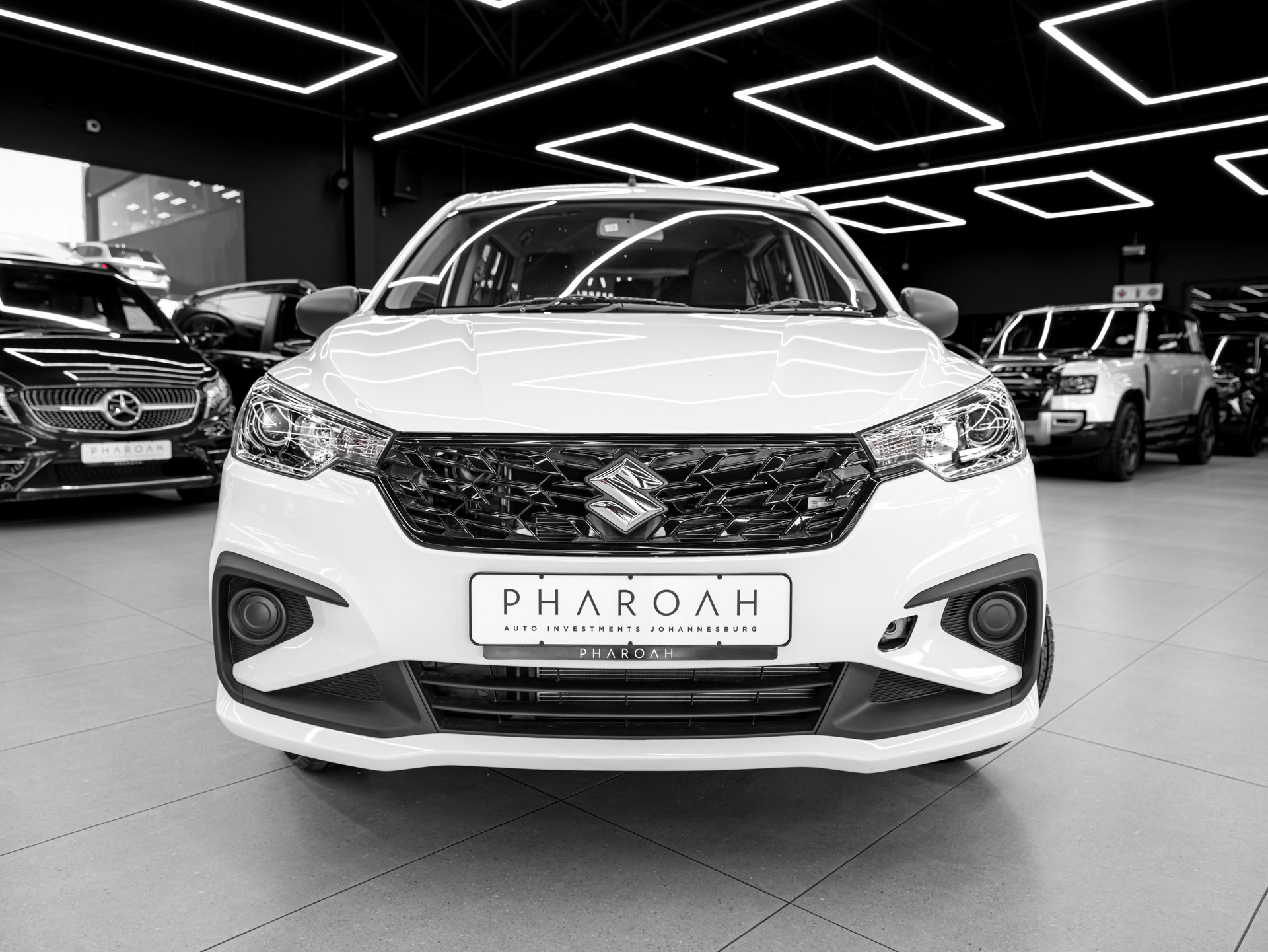 white suzuki ertiga 4