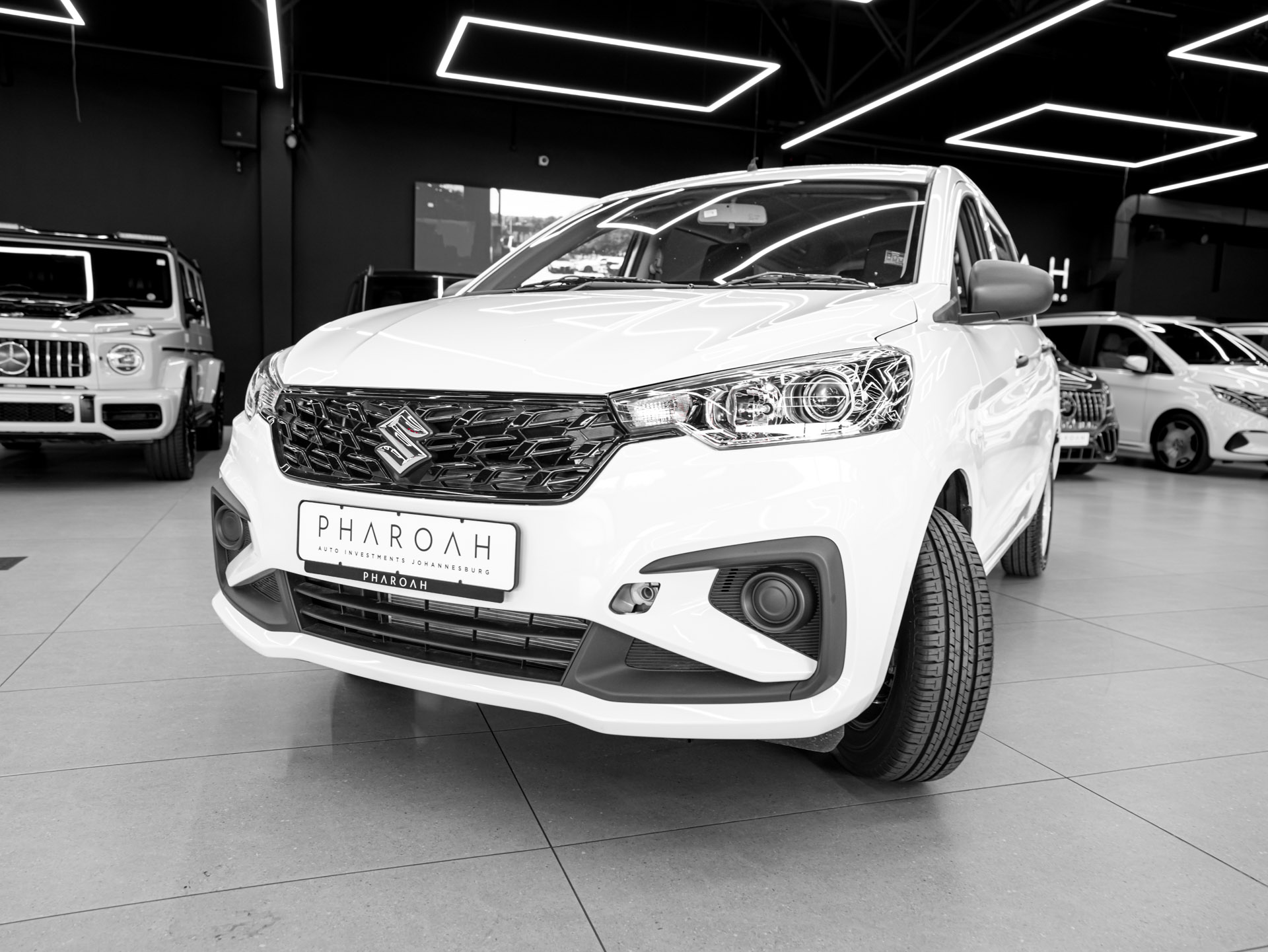 white suzuki ertiga 6