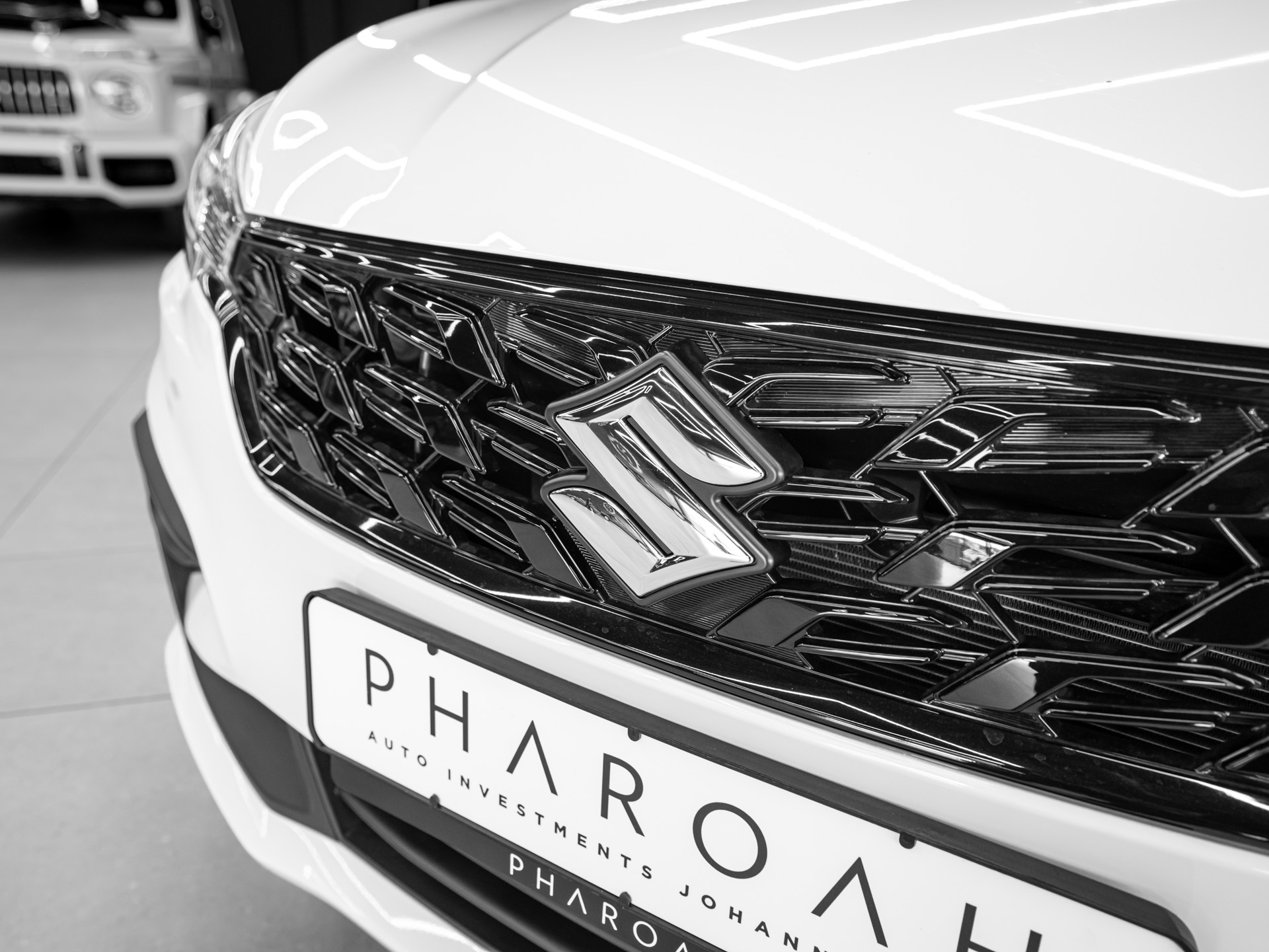 white suzuki ertiga 7