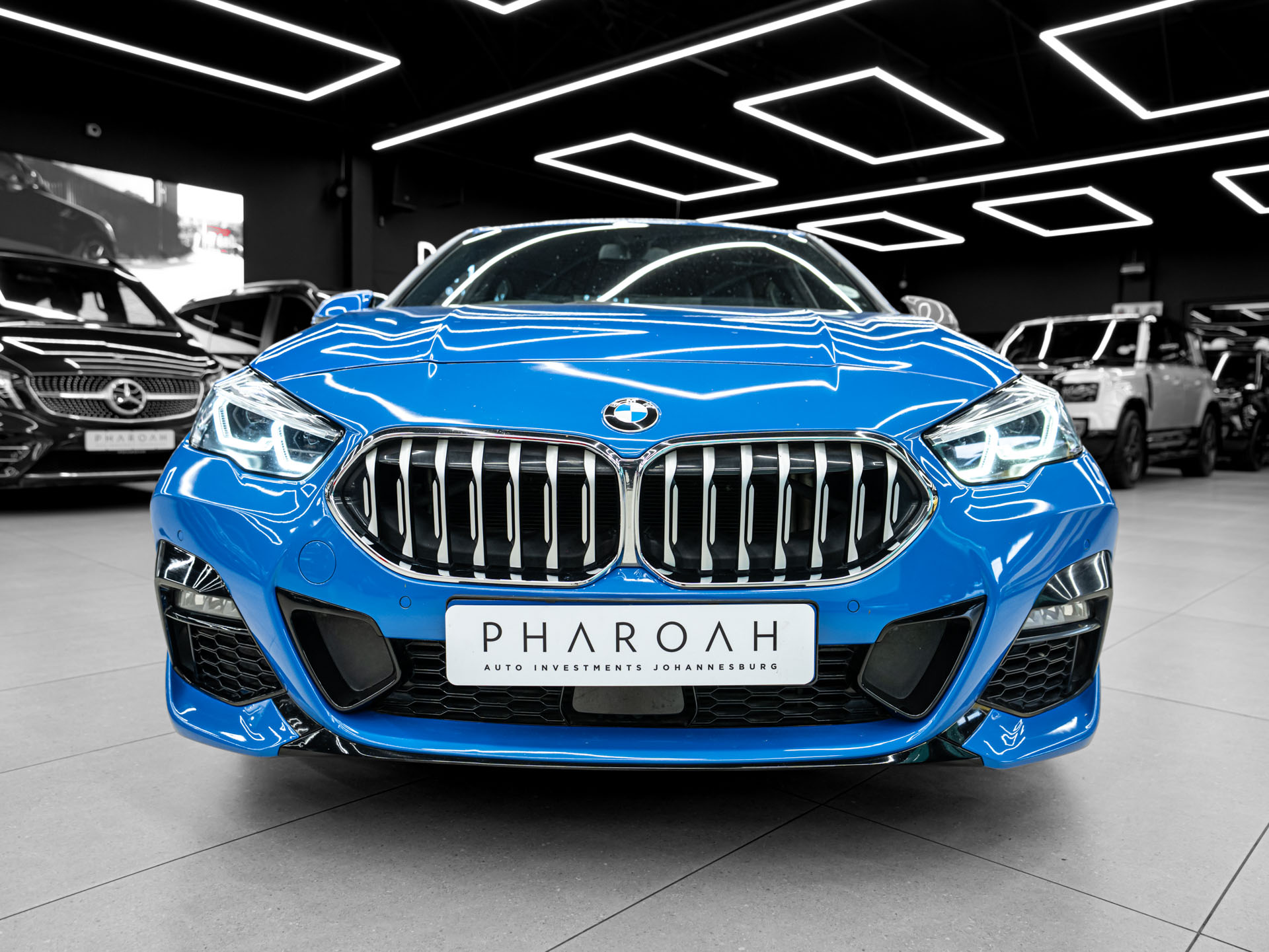 blue bmw 218i gran coupe 4