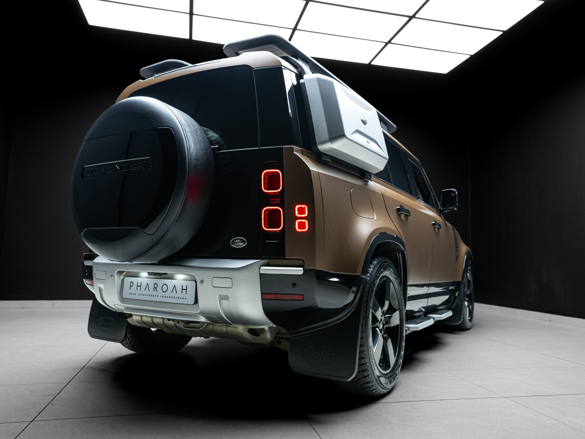 brown land rover defender d300 14