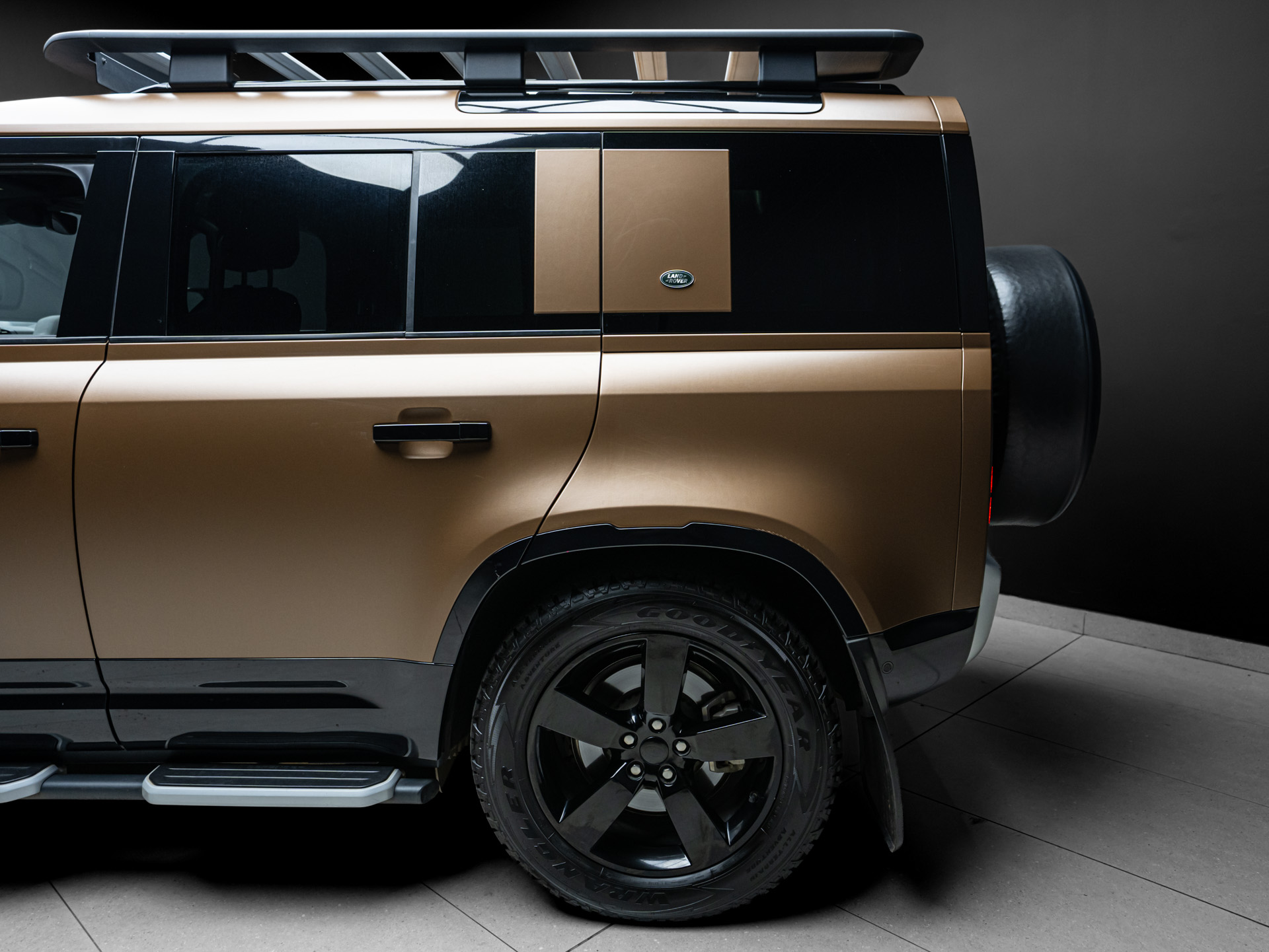 brown land rover defender d300 4