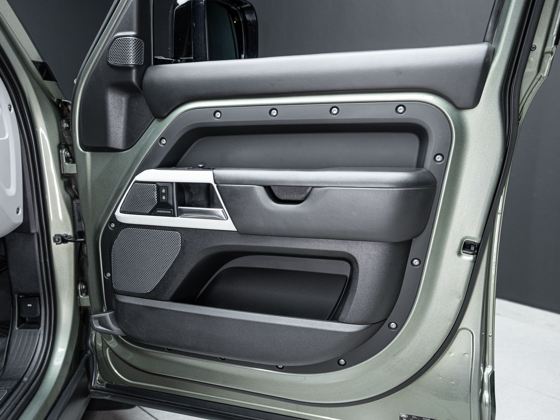 green land rover defender 18