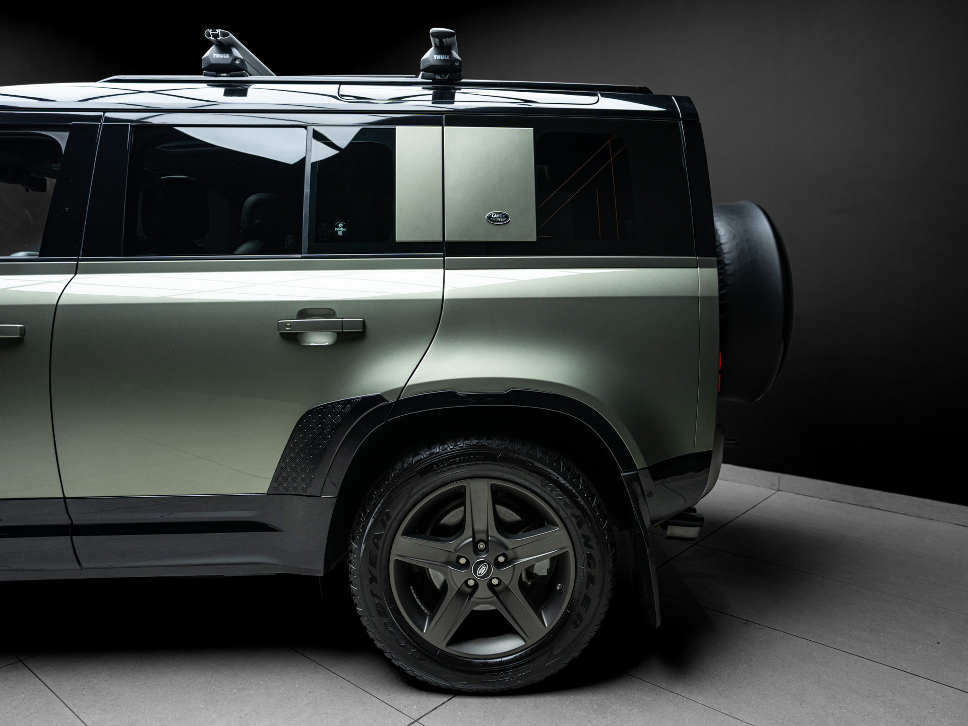 green land rover defender 4