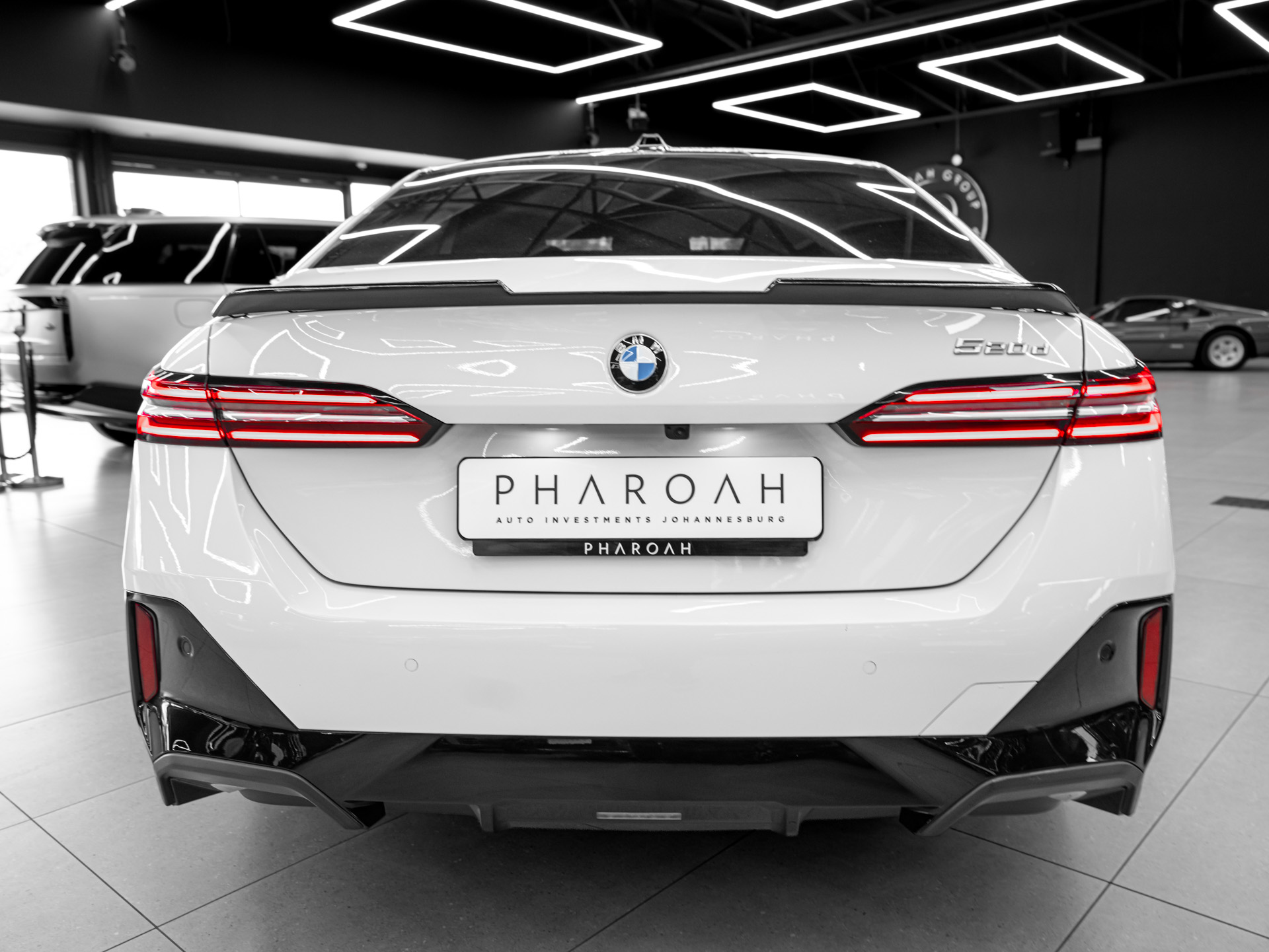 white bmw 520d 10