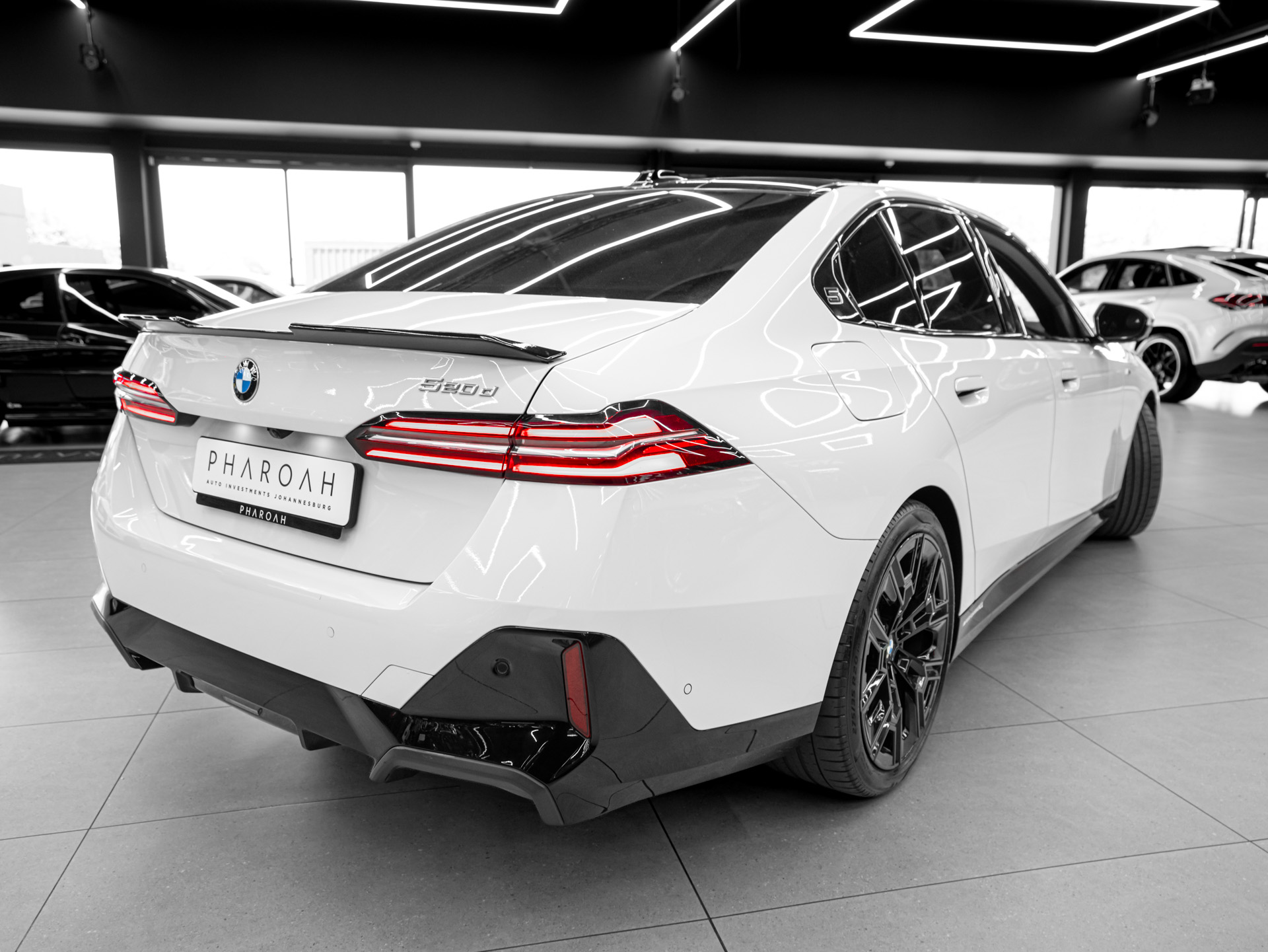 white bmw 520d 9