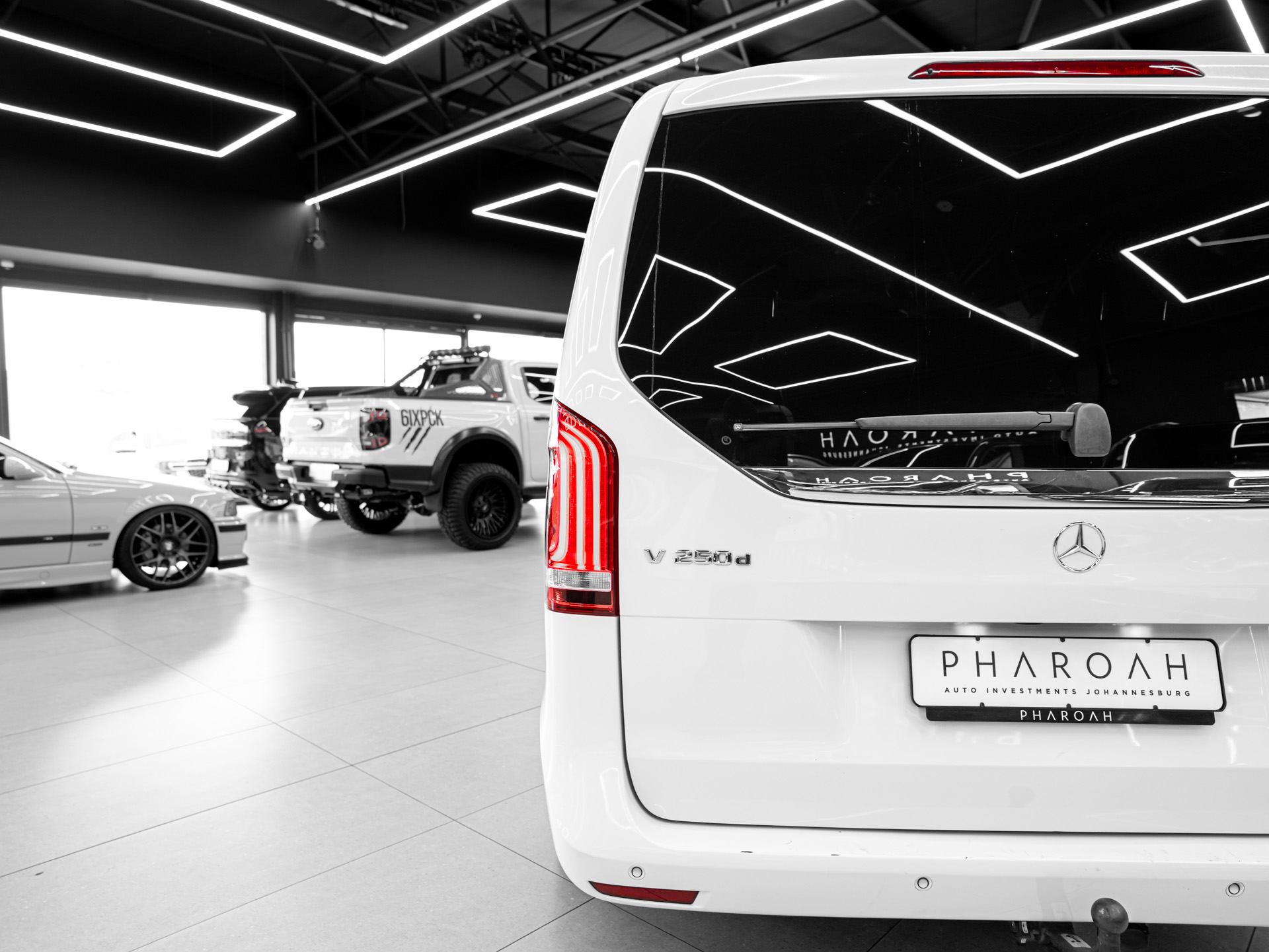 white mercedes benz v250d 12